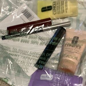 Clinique beauty kit - lipstick, mascara, wash, lotion and eyeliner, and mask